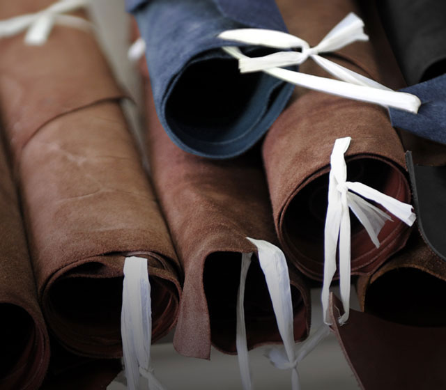 Rolls of different colored leathers.